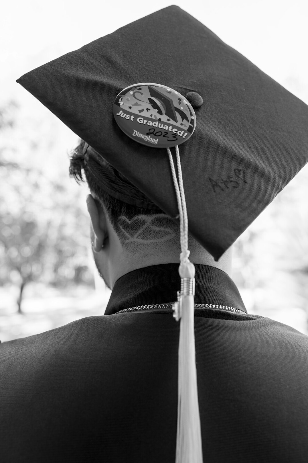 graduation cap on laptop
