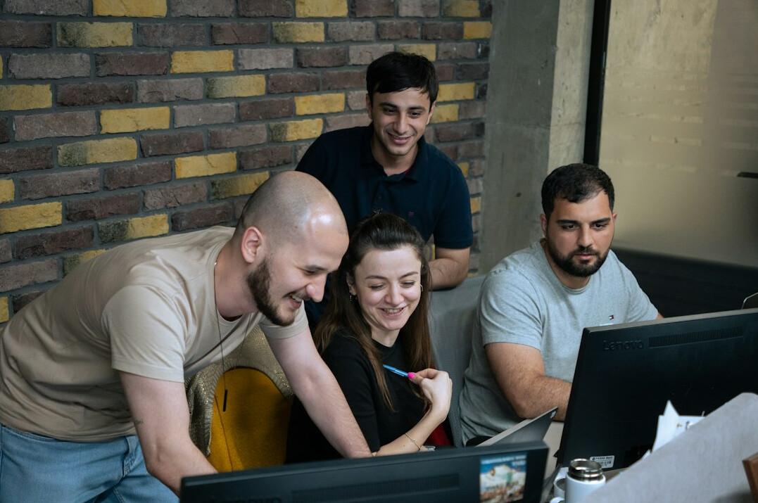 group of students learning coding